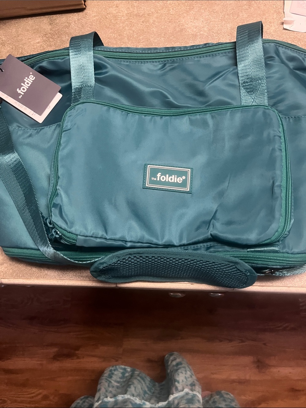 NWT the foldie carryon bag in teal